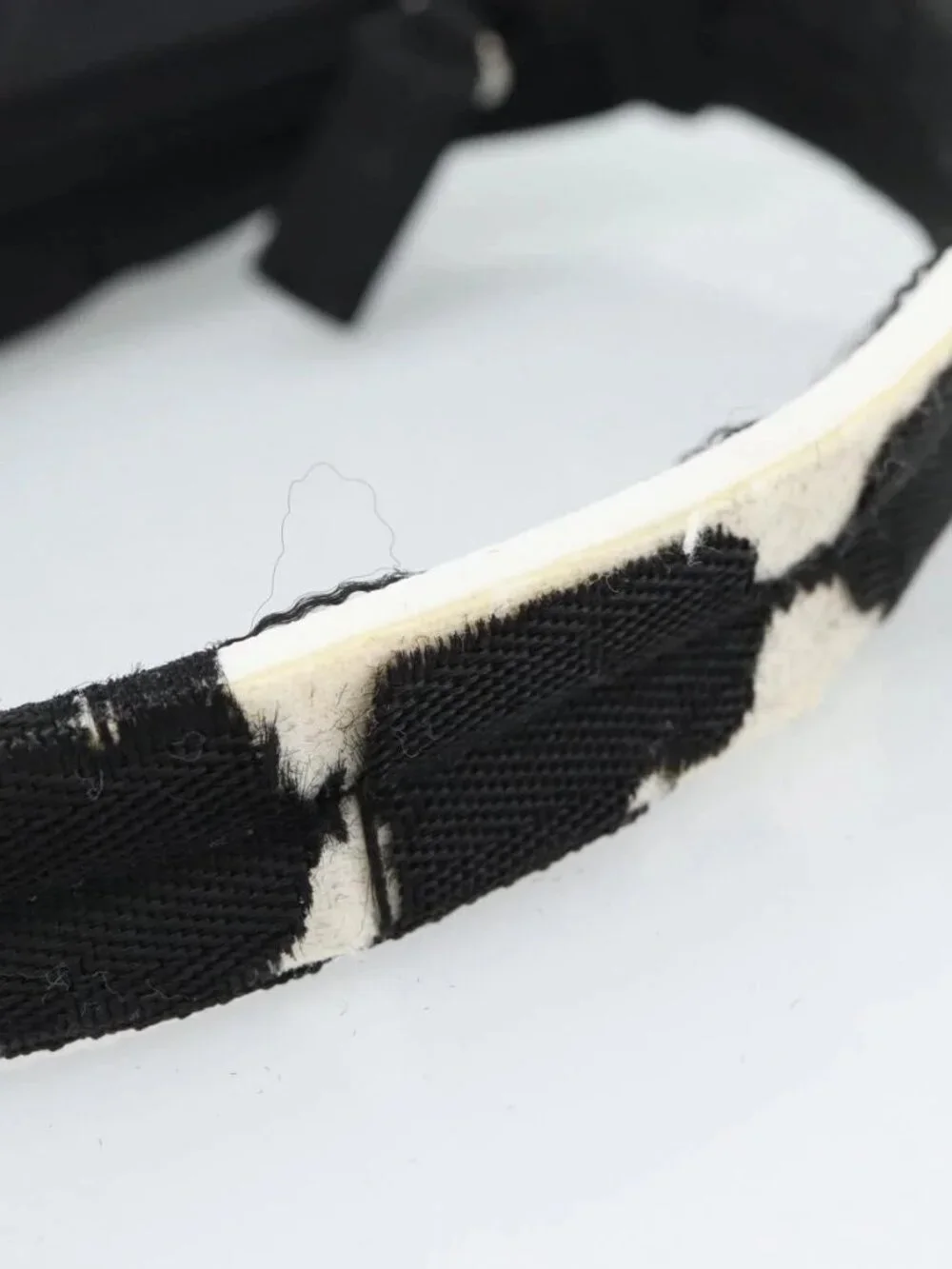 Prada brand	prada color	black